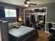 Bedroom featuring a closet, bed, dresser, and other bedroom furnishings at 516 Hickorywood Ave, Altamonte Springs, FL 32714