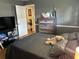 Comfortable bedroom with hardwood floors and good natural lighting at 516 Hickorywood Ave, Altamonte Springs, FL 32714