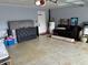 Large garage with storage and a door to outside at 516 Hickorywood Ave, Altamonte Springs, FL 32714