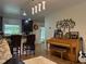 Open concept living area with a piano and breakfast bar seating at 516 Hickorywood Ave, Altamonte Springs, FL 32714
