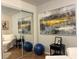 Mirrored Living Room with hardwood floors, bright natural light, and art on the wall at 516 Hickorywood Ave, Altamonte Springs, FL 32714