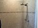 Shower stall featuring neutral tiles and modern shower head at 516 Hickorywood Ave, Altamonte Springs, FL 32714