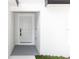 Close-up of the new home's front door, showing its fresh, modern design at 544 E Voorhis Ave, Deland, FL 32724