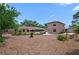 Expansive backyard featuring a pool, patio with outdoor seating, and a spacious mulched area, perfect for outdoor activities at 5496 S Nova Rd, Port Orange, FL 32127