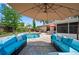 Inviting backyard with ample seating overlooking a sparkling pool and well-maintained landscaping, perfect for relaxing at 5496 S Nova Rd, Port Orange, FL 32127