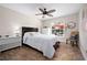 Well-lit bedroom with a ceiling fan and a window that allows natural light to enter the room at 5496 S Nova Rd, Port Orange, FL 32127