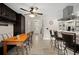 Light-filled dining area provides seamless access to kitchen and main entrance at 5496 S Nova Rd, Port Orange, FL 32127