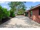 Paver and concrete driveway leading to the brick home at 5496 S Nova Rd, Port Orange, FL 32127