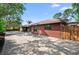 Paver and concrete driveway leading to the brick home at 5496 S Nova Rd, Port Orange, FL 32127