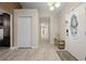 Bright and airy foyer with tile flooring, decorative front door, and views into the home at 5496 S Nova Rd, Port Orange, FL 32127