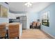 Bright kitchen with stainless steel appliances, eat-in nook, and a breakfast bar with seating at 5496 S Nova Rd, Port Orange, FL 32127