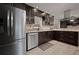 Stainless steel appliances and custom cabinets adorn this modern kitchen space at 5496 S Nova Rd, Port Orange, FL 32127