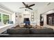 Cozy living room with vaulted ceilings, built-in shelves, and a window seat, creating a relaxing atmosphere at 5496 S Nova Rd, Port Orange, FL 32127