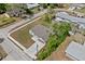 Aerial view of a single-Gathering home featuring a well-maintained lawn and driveway at 560 Sumner Ave, Orange City, FL 32763