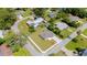 Aerial view of a community showcasing a home's location and neighborhood with lush trees at 560 Sumner Ave, Orange City, FL 32763