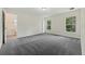 Spacious bedroom with large windows offering natural light and serene views at 560 Sumner Ave, Orange City, FL 32763