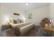 Bedroom featuring a cozy bed and a functional desk, creating a versatile space at 560 Sumner Ave, Orange City, FL 32763