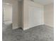 Bedroom featuring gray carpet floors and a double-door closet at 560 Sumner Ave, Orange City, FL 32763