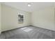 Bedroom with carpet flooring and window at 560 Sumner Ave, Orange City, FL 32763