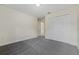 A spacious bedroom with a large closet and neutral carpet creates a cozy feel at 560 Sumner Ave, Orange City, FL 32763