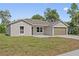 Inviting single-story home with a spacious lawn at 560 Sumner Ave, Orange City, FL 32763