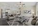 Living room showcases stylish furniture and an open layout connecting to the dining area and kitchen at 560 Sumner Ave, Orange City, FL 32763
