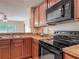Modern kitchen featuring stainless steel appliances and ample counter space at 564 Mount Olympus Blvd, New Smyrna Beach, FL 32168