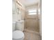 Updated bathroom featuring a tiled shower and modern fixtures at 566 S Floyd Cir, Deltona, FL 32725