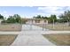 Charming single-story home with a fenced yard and covered carport at 566 S Floyd Cir, Deltona, FL 32725