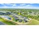 Beautiful aerial view of a Florida home in a neighborhood with ponds and well-maintained landscaping at 6212 W Fallsgrove Ln, Port Orange, FL 32128