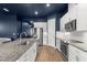 Modern kitchen features stainless appliances, granite countertops, white cabinets and subway tile backsplash at 6212 W Fallsgrove Ln, Port Orange, FL 32128