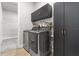 Laundry room features front load washer and dryer plus plenty of storage cabinets at 6212 W Fallsgrove Ln, Port Orange, FL 32128