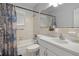 Bathroom featuring a bathtub with shower and a sink with ample countertop space at 632 Tarragona Way, Daytona Beach, FL 32114