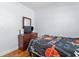 Bedroom includes a comfortable bed and a wooden dresser, creating a peaceful retreat at 632 Tarragona Way, Daytona Beach, FL 32114