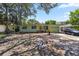 Inviting single-story home with a beautiful lawn, mature tree and front-facing garage at 632 Tarragona Way, Daytona Beach, FL 32114
