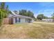 Cozy single-story home featuring a fenced yard, solar panels, and a well-maintained lawn at 6509 Lake Lerla Dr, Apopka, FL 32712