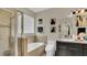 Bright bathroom showcasing a glass enclosed shower and separate tub at 680 Preakness Cir, Deland, FL 32724