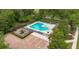 Aerial view of the community pool, playground, and parking area at 680 Preakness Cir, Deland, FL 32724