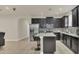 Spacious kitchen featuring stainless steel appliances, granite countertops, and modern cabinetry at 680 Preakness Cir, Deland, FL 32724
