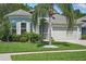 Home with lush lawn, meticulous landscaping, and charming curb appeal at 6820 Vintage Ln, Port Orange, FL 32128