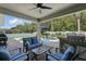 Relaxing outdoor patio with a pool, grill, and comfortable seating at 6820 Vintage Ln, Port Orange, FL 32128