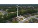 Overhead view of a neighborhood with the house surrounded by greenery in a well-established community at 703 Elkhorn Fern Ln, Deland, FL 32720
