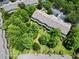 Overhead drone shot of landscaped condo complex with parking at 783 Shropshire Loop, Sanford, FL 32771