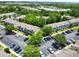 Aerial view of the community with green landscaping and assigned parking at 783 Shropshire Loop, Sanford, FL 32771