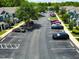 Aerial view of a condo parking lot with green landscaping at 783 Shropshire Loop, Sanford, FL 32771