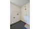 Functional laundry room space with connections for a washer and dryer, plus built-in shelving at 834 Sugar House Dr, Port Orange, FL 32129