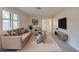 A cozy living room features comfortable seating, stylish decor, and plenty of natural light at 834 Sugar House Dr, Port Orange, FL 32129