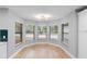 Bright breakfast nook features lots of windows with a great view at 9720 Fairway Cir, Leesburg, FL 34788