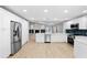 Spacious kitchen with modern stainless steel appliances, stylish countertops, and ample cabinet space at 9720 Fairway Cir, Leesburg, FL 34788