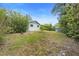 Lush green backyard with plenty of privacy for outdoor gatherings and recreation at 990 W French Ave, Orange City, FL 32763